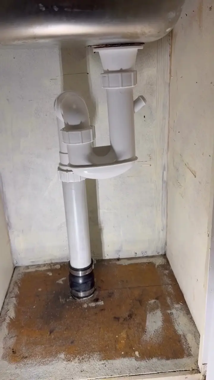 Complete new PVC drainage installed beneath the kitchen sink after the leaking galvanised-steel drainage was removed